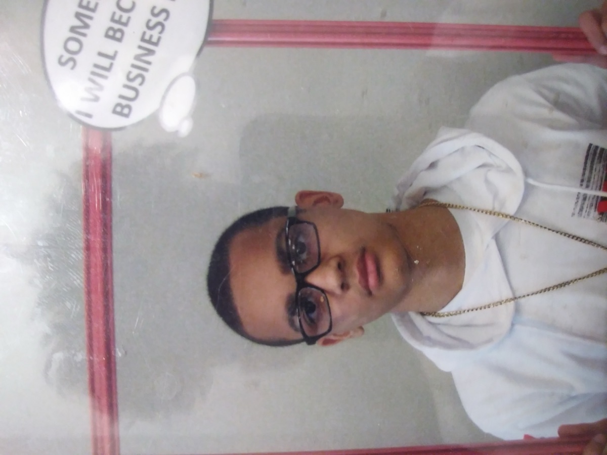 Que at Career Day — two angles of the original photo